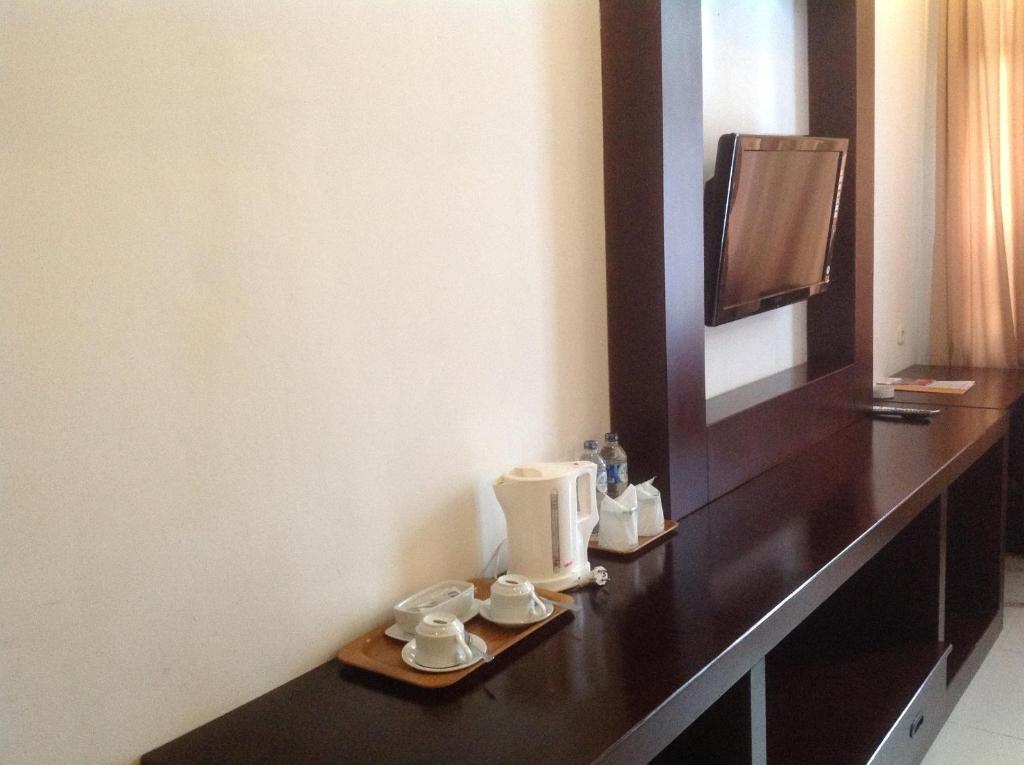 Hotel Swarna Dwipa パレンバン エクステリア 写真